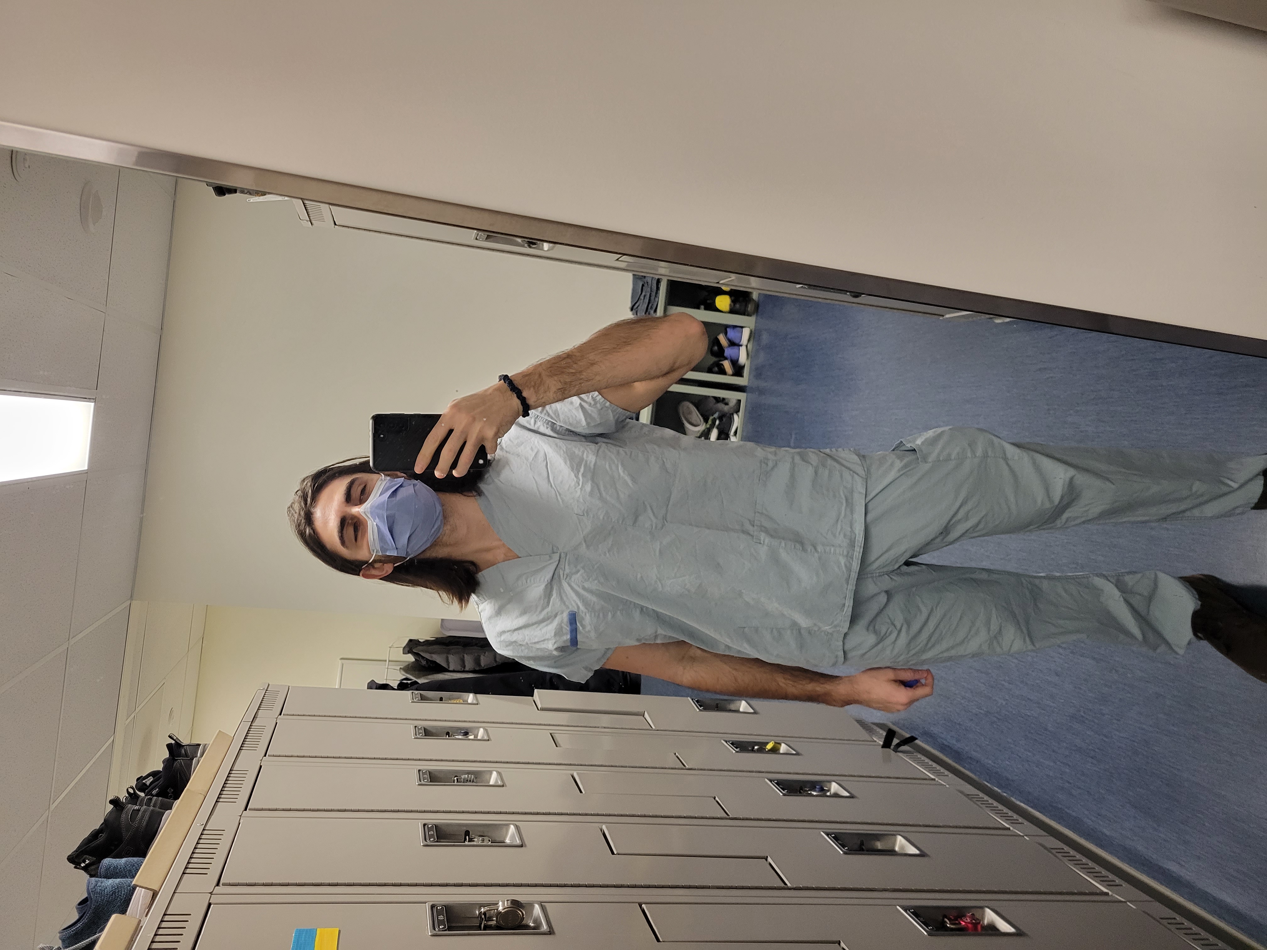 Ryan in scrubs, on the phone